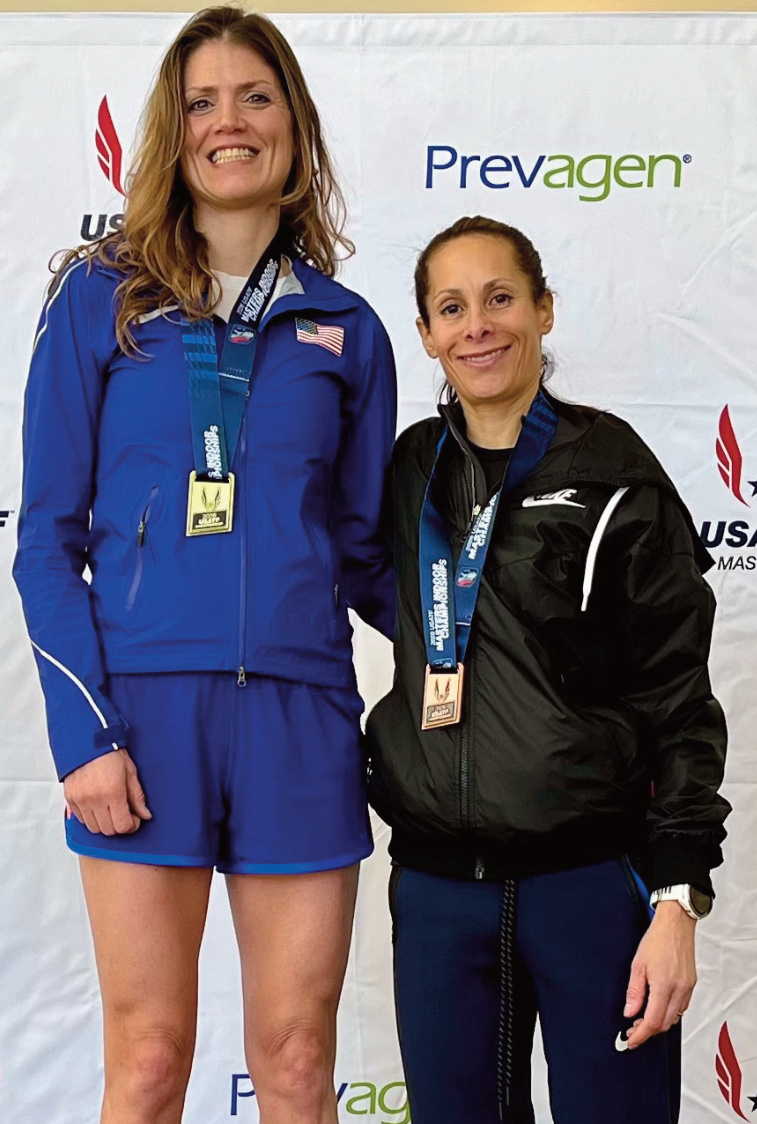 Heather Davel Langreck (left) is shown with the runner-up in the Masters mile.