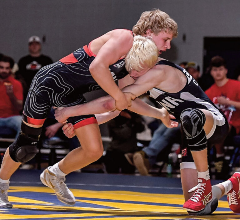 Carey grabs a leg as he tries for a takedown. Bret Peterson photo.