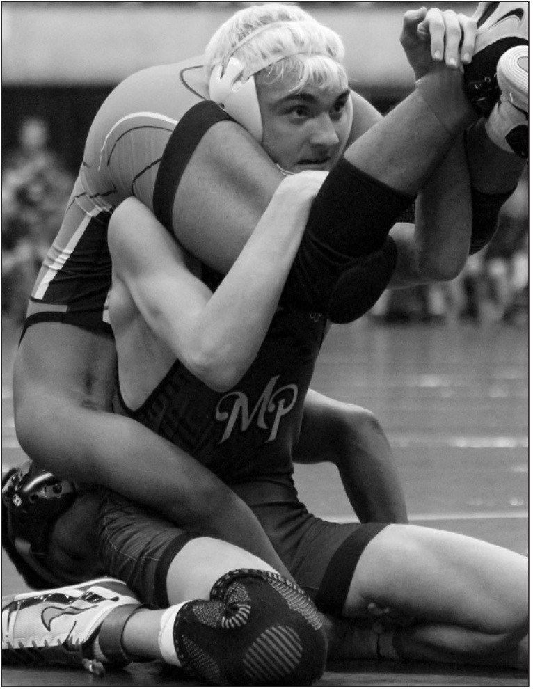 At 144: Sammy Springer with a pin over Erick Bautista in 2:54. MP Schools photo.