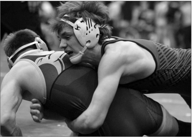 At 157: Elliot Kite was decisioned by Nolan Anzia 12-6. Anzia was a 2026 Individual State Qualifier. MP Schools photo.