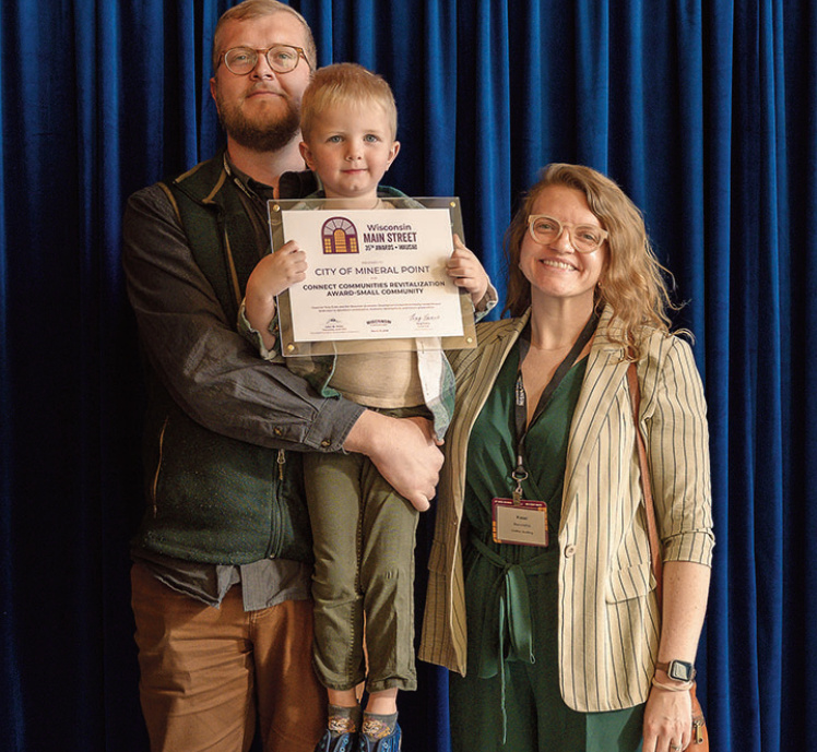 Brian, Luca and Kassi Blanchette accepted a success story award from the Wisconsin Economic Development Corporation for their store, Staple & Fancy. Contributed photo