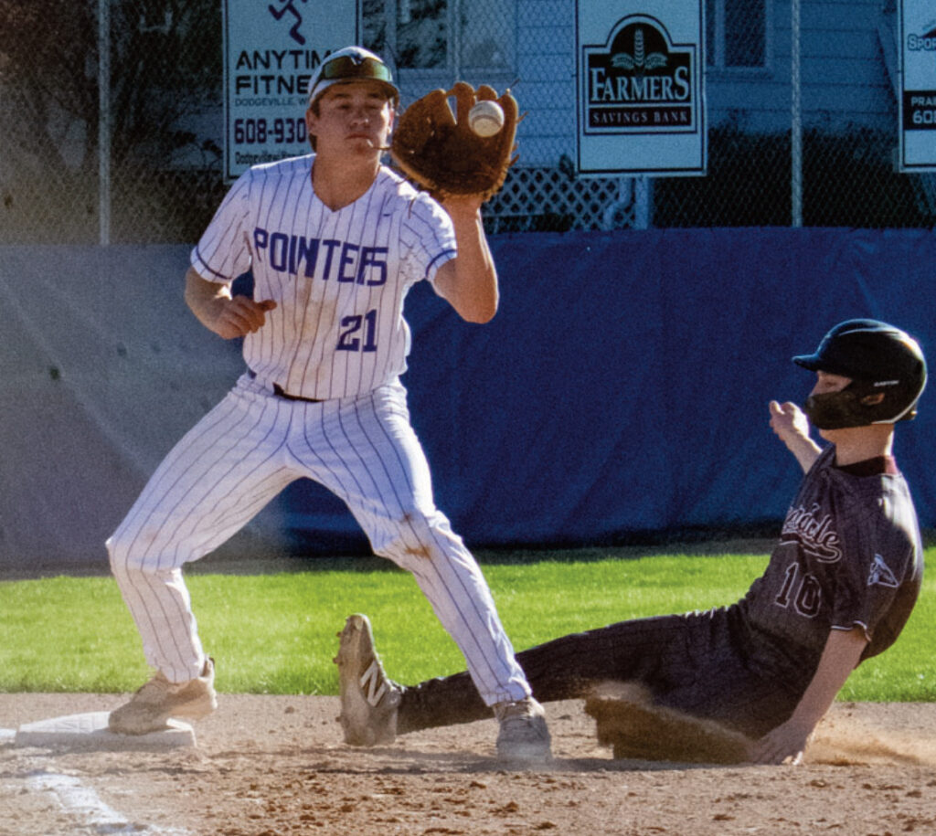 Third sacker Elliot Kite takes a throw to catch a sliding Chieftain runner. Robin Wiegman photo.