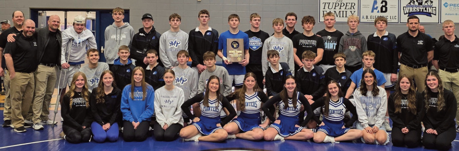 Pointer wrestlers went unbeaten in SWAL Duals, were Division 3 Regional and Sectional Team- champs and took part in Team State, plus they had 6 qualify for Individual State. Team members are (I-r) front: Managers Cambrey Carey, Ellie Busch, Kit Finley, Annabelle Busch, Cheerleaders Irene Martinez, Lily Fox, Lucy Paynter, Shayna Sigg, Managers Addie Burris, Cyntanah Nafzger, and Emmie Burris; middle: Dakota Miller, Blake Robb, Traevyn Galle, Johnny Robinson, Memphis Burkhalter, Gunner Reichling, Easton Brunett, Trigg Riley, Boden Chambers; back Assistant Coach Mike Potter- ton, Head Coach Curtis Fiedler, Assistant Coach TJ Burke, Clayton Yanna, Sammy Springer, Sawyer Dannenberg, Elliot Kite, Emmett Collins, Brady Haas, Jake Dannenberg, Mason Scullion, Assistant Coach Bo Levetzow, Gus Tucker-Sorum, Tyler Vondra, Liam Carey, Cayden Krueger, Assistant Coach Grant Miller, Assistant Coach Roen Carey.
