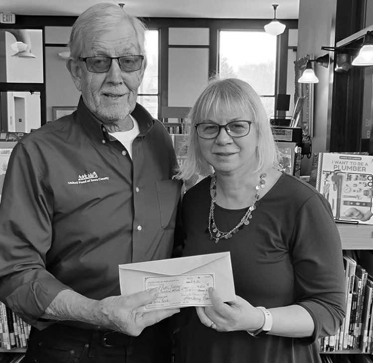 Pictured is Larry McNeill, United Fund of Iowa County Board Director and Diane Palzkill, Mineral Point Public Library Director.