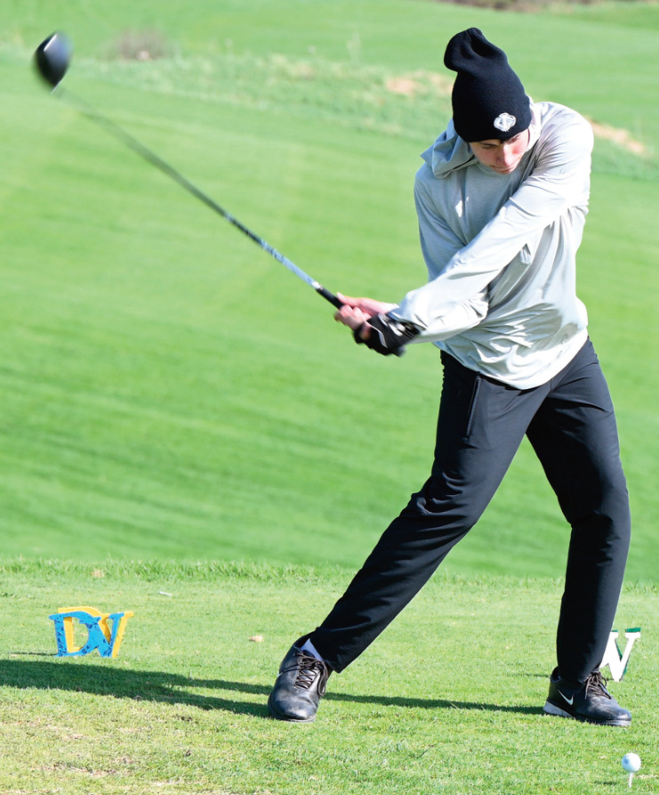 Drew Aschliman tees off on a hole at Barneveld. Photo by Anita Schmid.