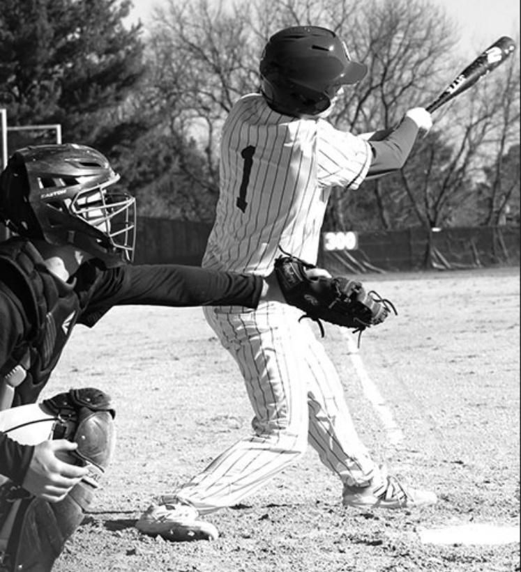 Pointer Conner Rolli takes a cut at this pitch in Friday's game at Iowa-Grant Photo by John Dalton.