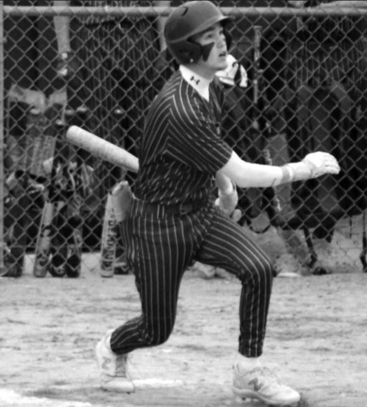 Pointer Brylen Lee and teammates watch as he connects on this drive to right field. Photo by John Dalton.