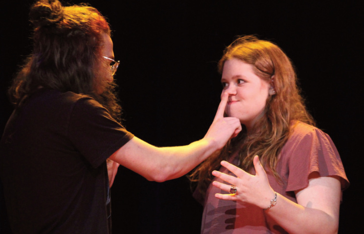 Gayle (Milena Straka) tries to return all the love she received from her boyfriend, Lendall (Gabe Hook), in large bags, demanding the love he gave her back, sur- prisingly ending in an engagement ring.