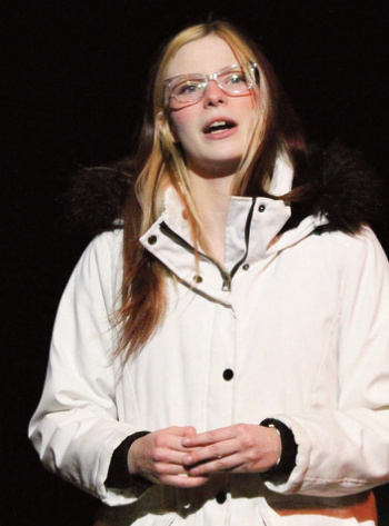 Narrator (Miley Coniber) helps inter- twine the seven scenes of the play.