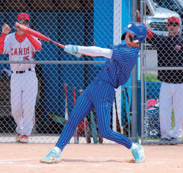 Pointer Brett Bossert connects on this pitch against Brodhead on Saturday. Photo by John Dalton.