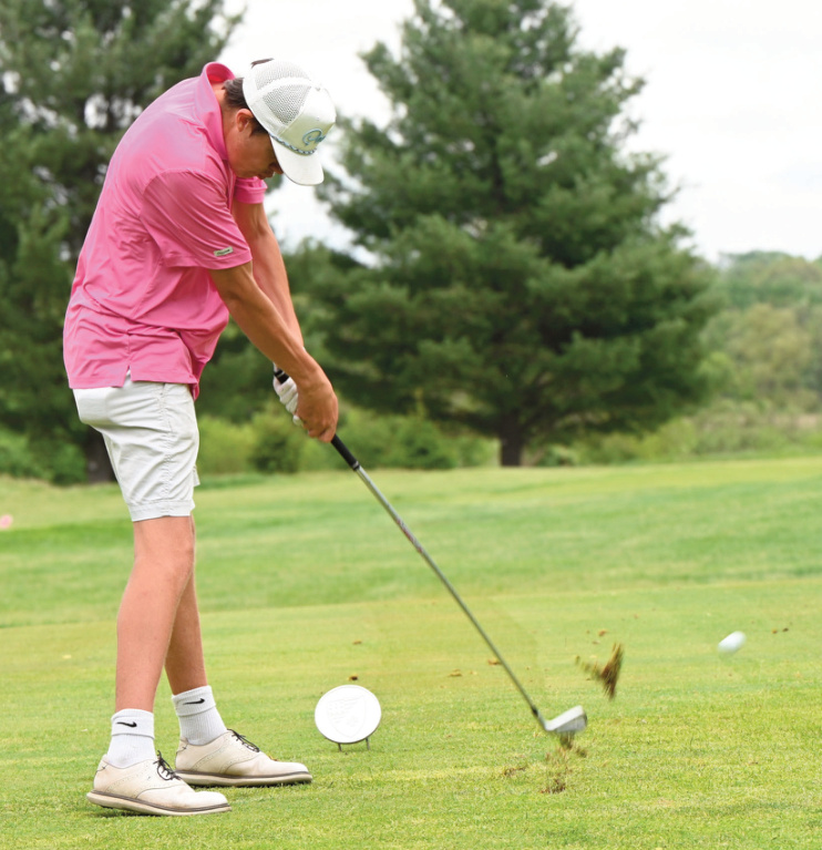 Gaige Godfrey with a shot off the tee. Anita Schmid photo.