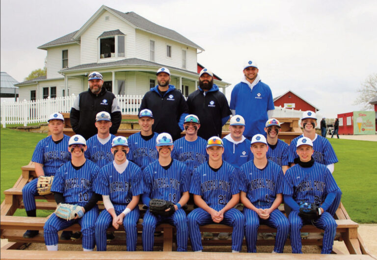 This group of Pointers baseball players had the chance to play at the Field of Dreams. From left to right are front: Grady Finley, Brylen Lee, Hudson Schroeder, Elliot Kite, Jackson Wiker, and Adam Cody; middle: Braeden Gallagher, Keegan Wenger, Cole Ripp, Evan Kearns, Clayton Yanna, Conner Rolli, and Brett Bossert; back: coaches Curtis Fiedler, Brett Lawinger, Miles Rolli, and Dakota James.