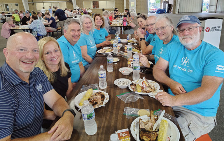 SHP members eating BBQ chicken