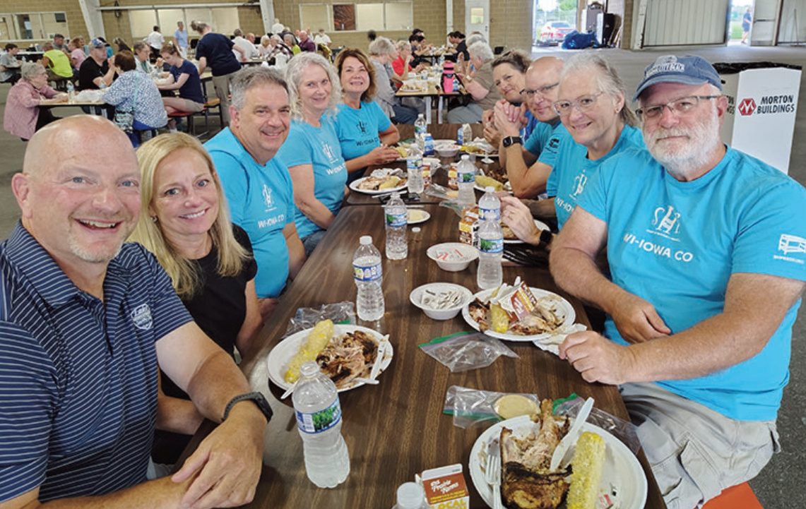 SHP members eating BBQ chicken