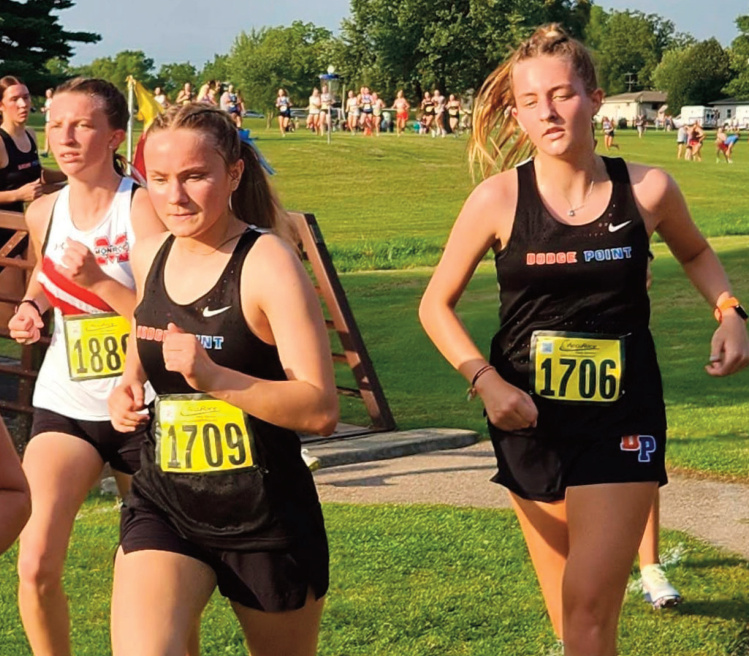 Payton Christopher (1709) leads teammate Lilly Houtakker (1706)