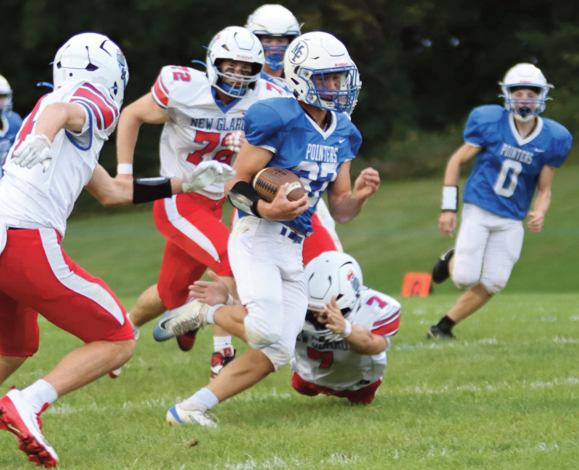 Mason Scullion tries to slip through a hole. Photo by Cambrey Carey.