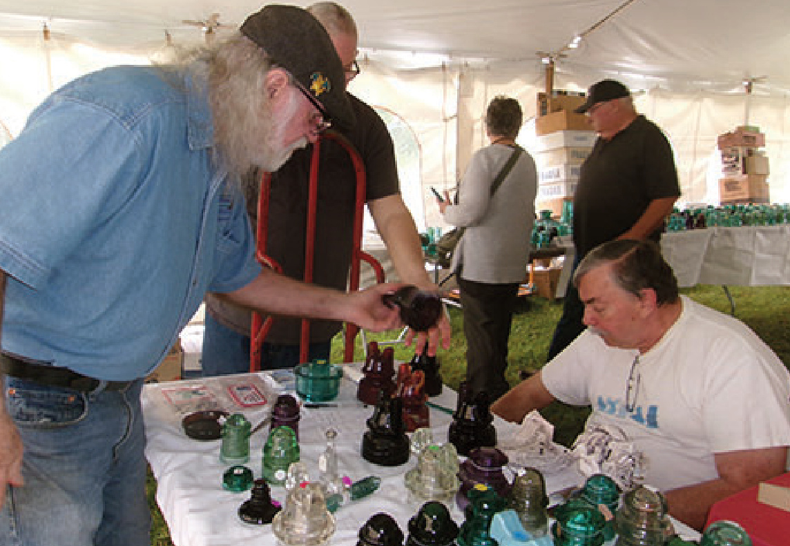 An insulator show outside the Mineral Point Railroad Museum drew dealers from seven states and both collectors and curious people Saturday.